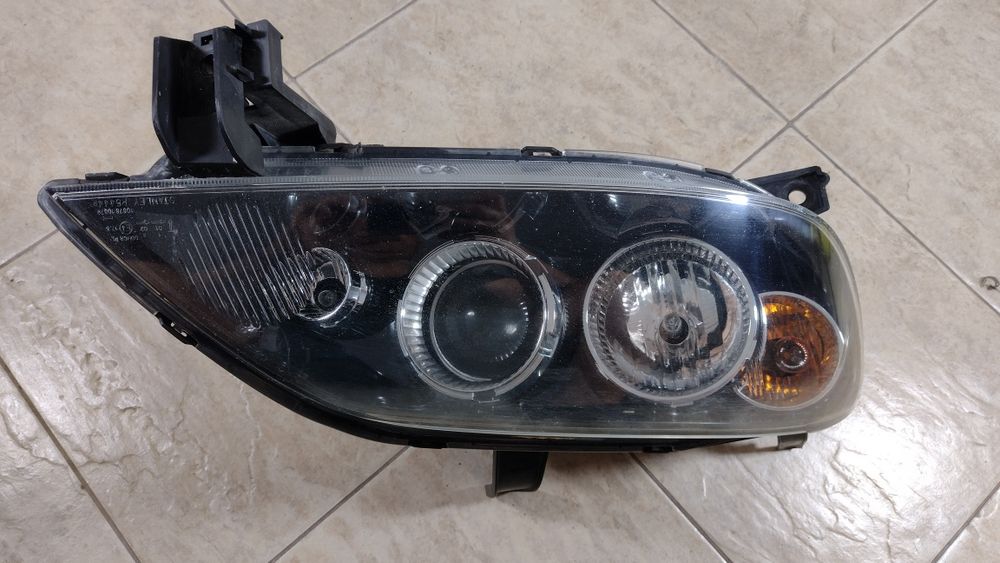 Mazda 2 II Lift DY lampa reflektor Europa prawy przód wysyłka