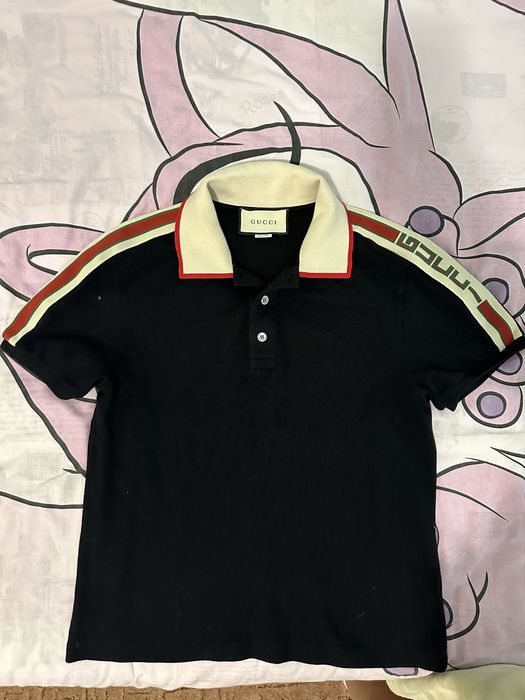 Поло Gucci.