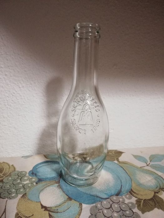 Bolsa pele/garrafa Schweppes