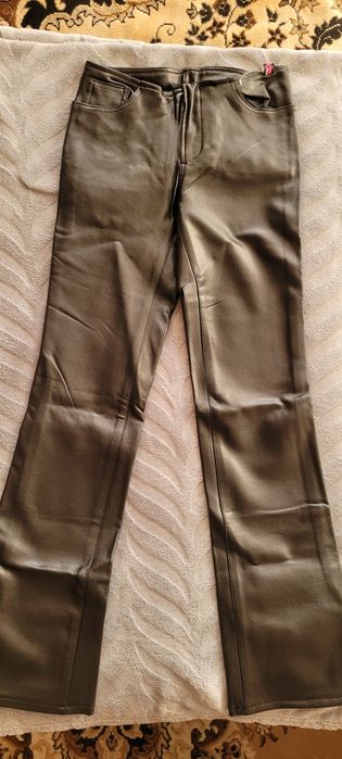 Штани нові з екошкіри для дівчинки