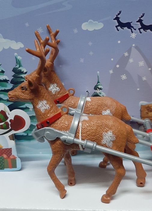 Музична іграшка.
Різдвяна карета з оленями.