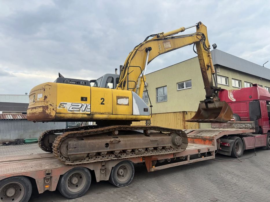 New Holland E215  1 wlasciciel , szybkozłacze , szyby ok , silna , cumins