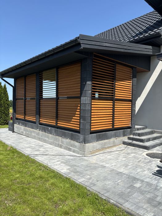 Żaluzje drewniane tarasowe ruchome deseczki zabudowa tarasów i altan