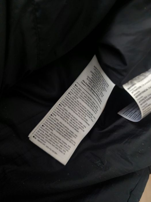 Puchową czarna kurtka nike XS