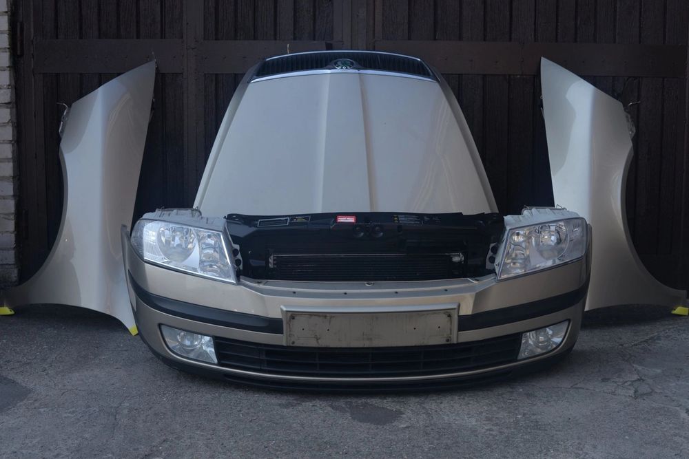 MASKA ZDERZAK GRILL BŁOTNIK LAMPA H7 XENON PAS BELKA SKODA OCTAVIA II 04-08