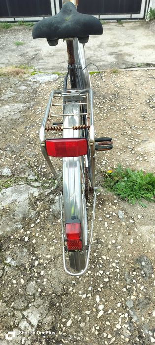 bicicleta clássica de senhora e de marca conceituada