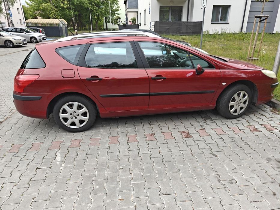 407sw 2.0 benzyna