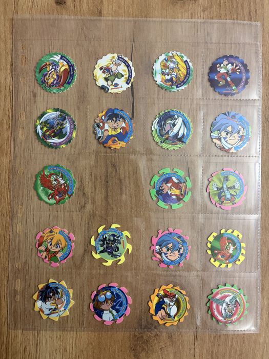 Beyblade spinner tazos 125/172