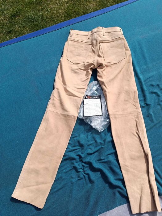 Spodnie skórzane Tschul jasne rozm 33. S/M unisex