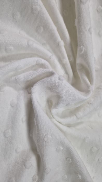 Dzianina biała wytłaczana szer.165 cm.