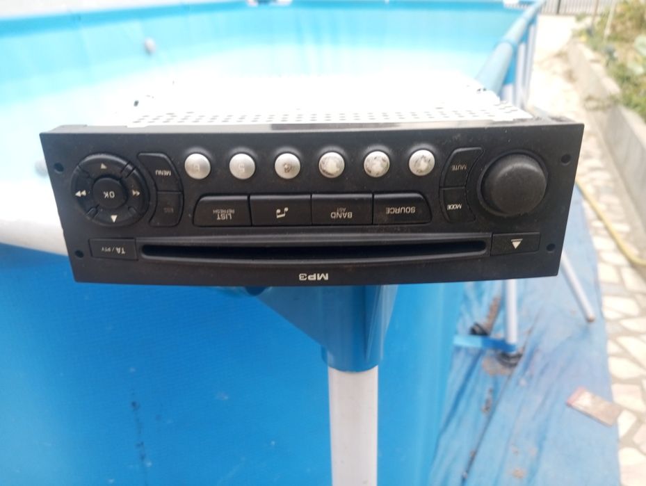 Óticas esquerdo e direito  auto radio citroen grande Picasso 2009