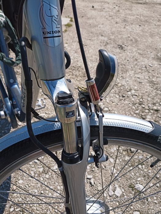 Rower elektryczny union switch z ładowarką i torbą