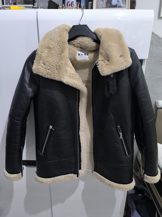 Ciepła kurtka z kożuszkiem.