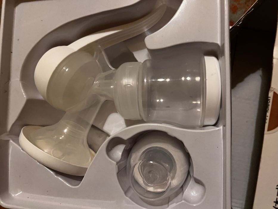 Conjunto bomba de tirar leite materno manual e saquinhos de congelar leite