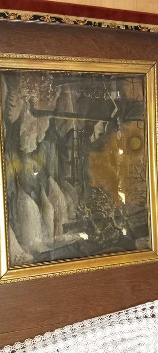Stary obraz na papierze w dużej złoconej ramie
