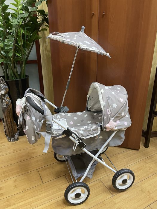 Дитяча коляска с парасолькою