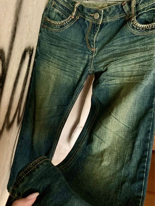 Трендові потерті баггі джинси.