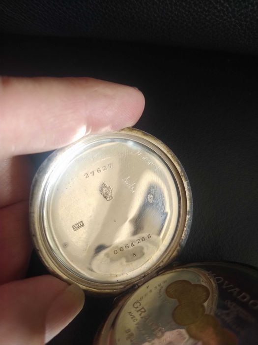 Antigo relogio de bolso Movado, em prata. Trabalha muito bem