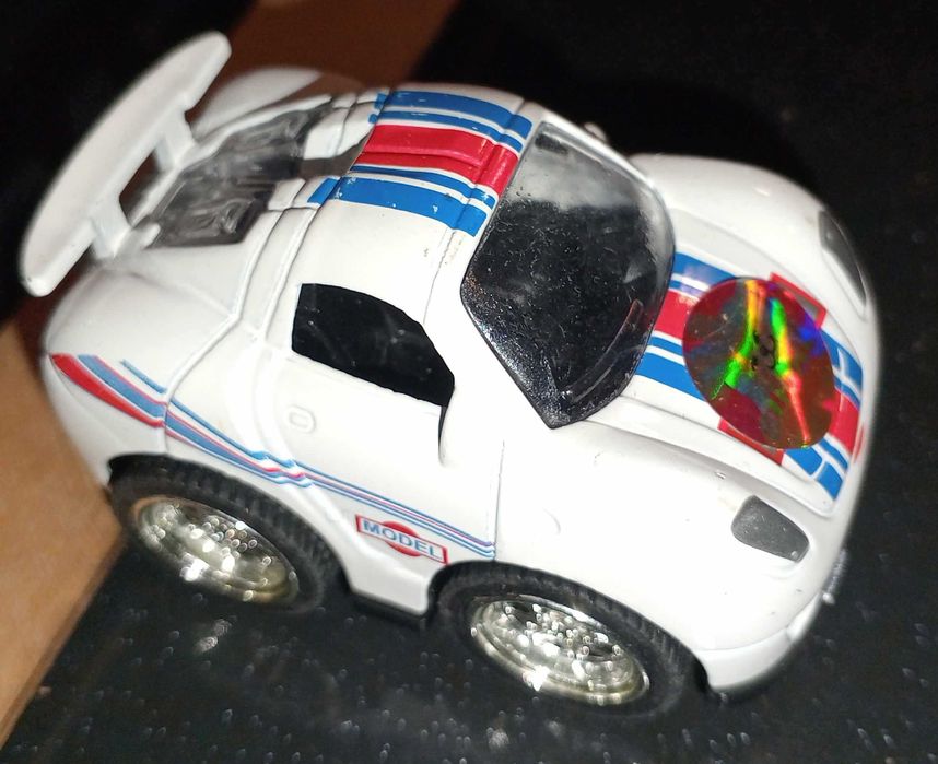 Игрушка машинка спортивная ралли.