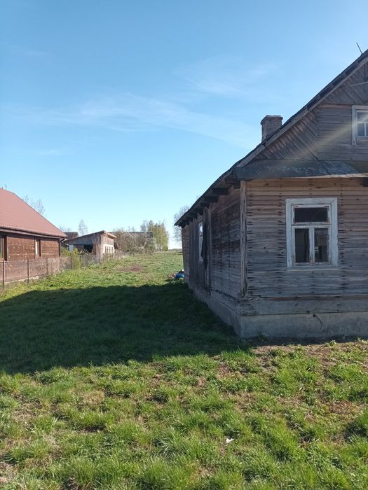 Działka siedliskowa z domem drewnianym