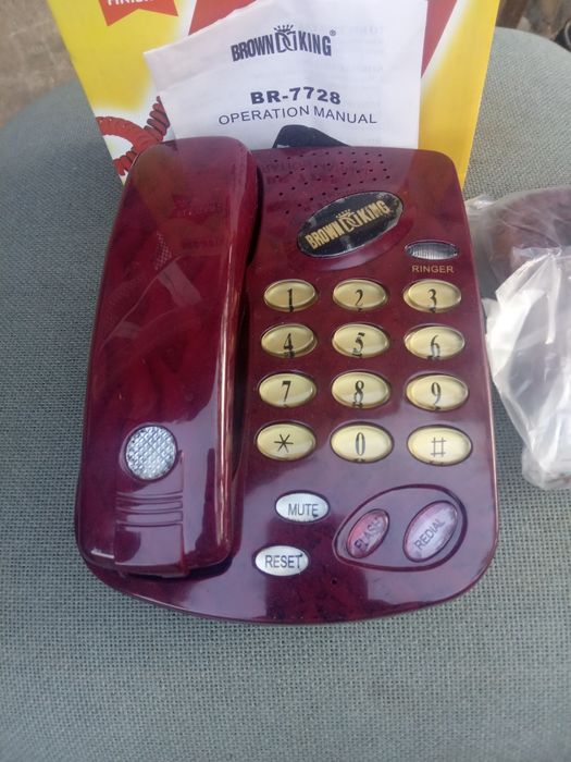 Домашній телефон новий