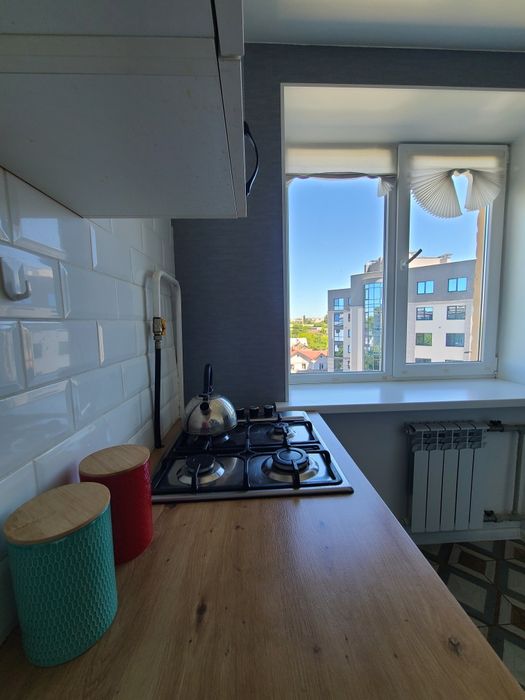 Затишна студія в центрі з балконом і видом на місто