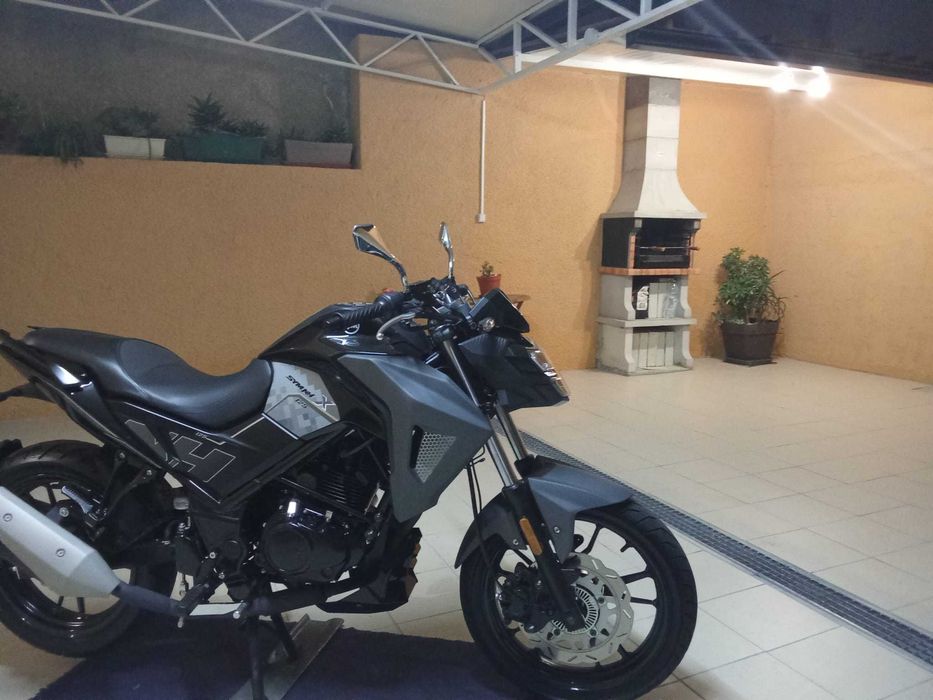 Mota sym 125cc como nova.