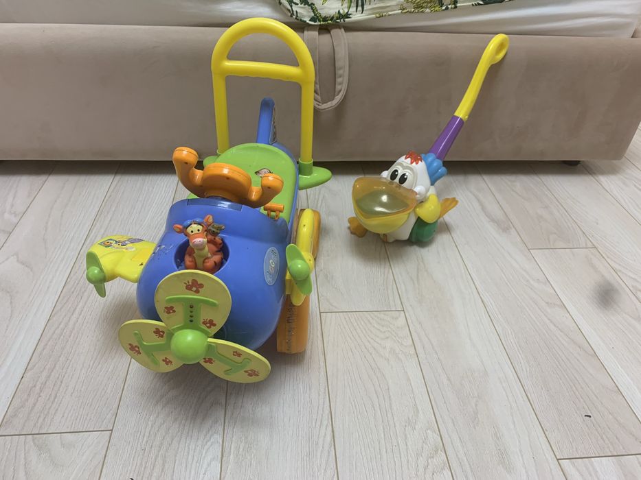 Іграшка каталка пелікан