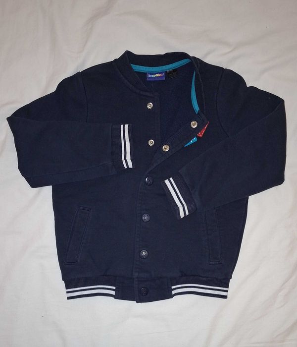Bluza bomberka zapinana na napy na plecach dinozaur