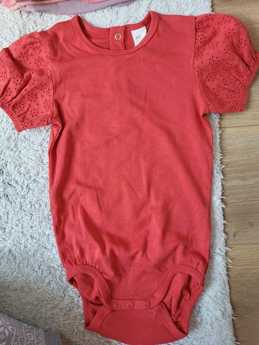 H&M body 104 koronkowe rękawki zapinana na karku
