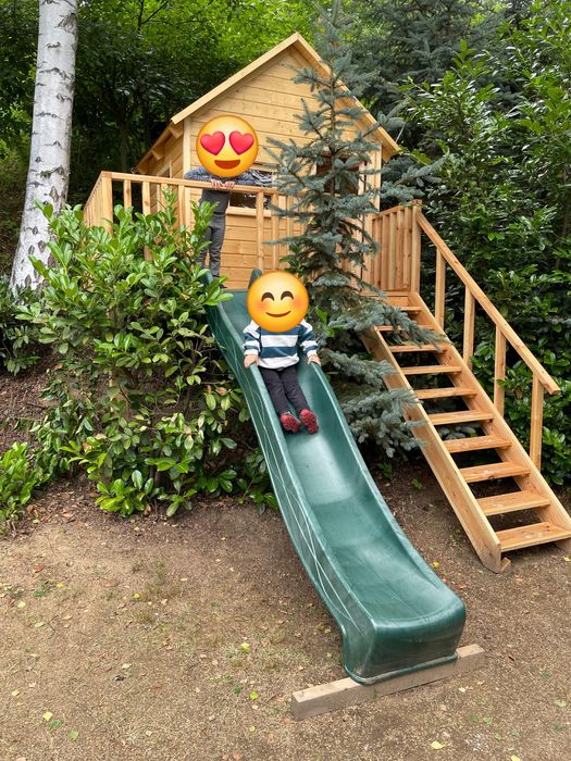 Domek dla dzieci do ogrodu z tarasem i zjeżdżalnią