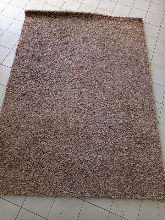 Tapetes de pêlo bege