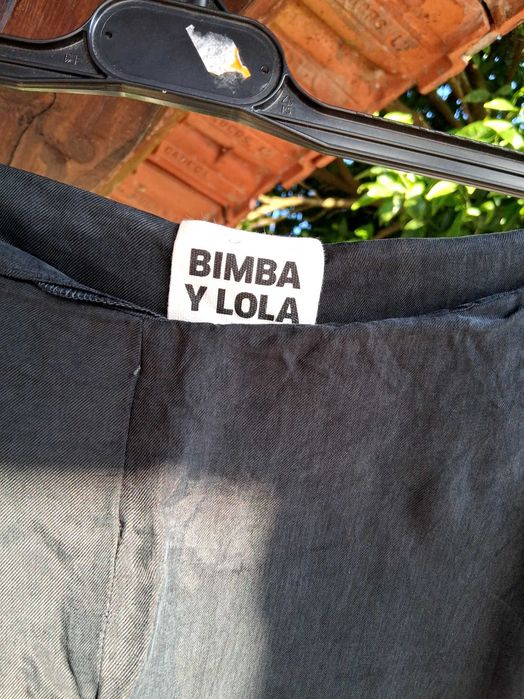 Calça Bimba Y Lola e mala Guess.