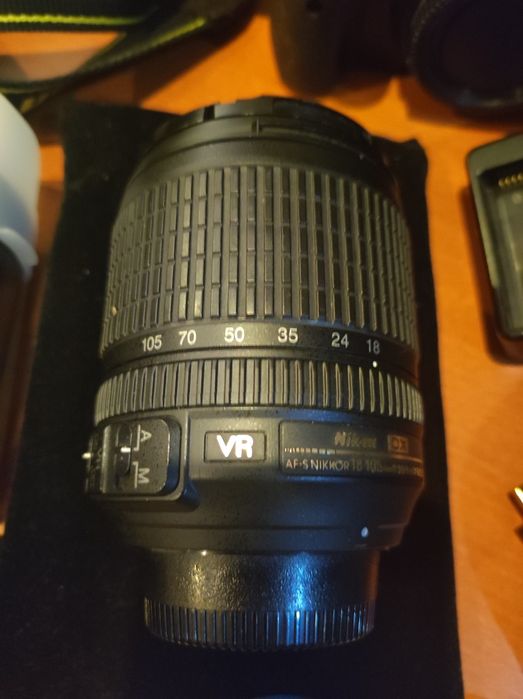 Nikon D5100 + lente 18-105 + mala + 2/ flash