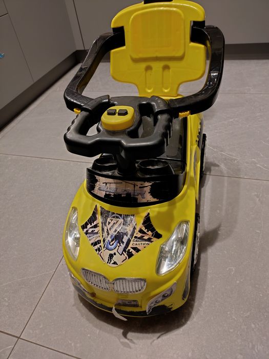 Jeździk pchacz auto z melodyjkami