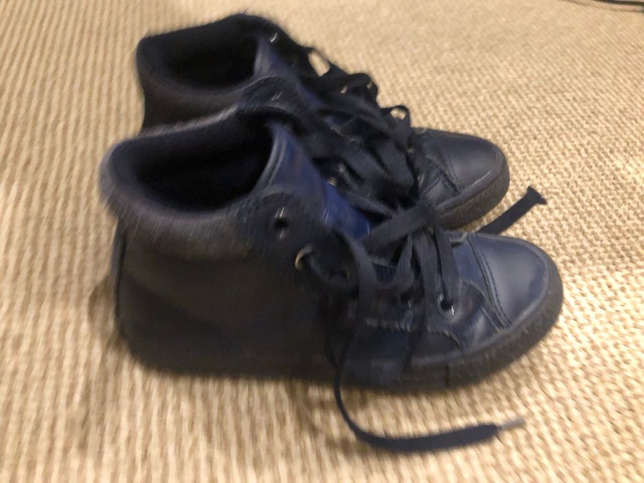 Converse all star em pele