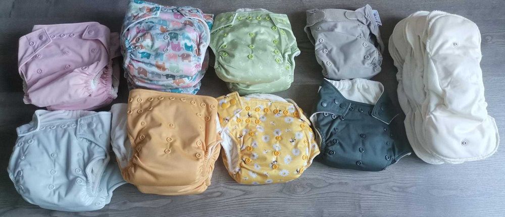 Selling 31 reusable diapers – New, only used 3 newborn diapers