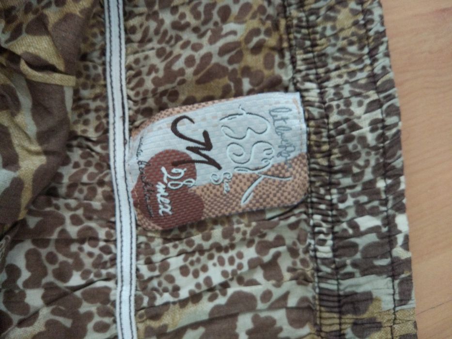 Macacão Preto e Leopardo