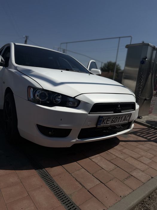 Mitsubishi Lancer 2012 VIN JMBSRCY1ACU005601 фото оголошення 2 з 19