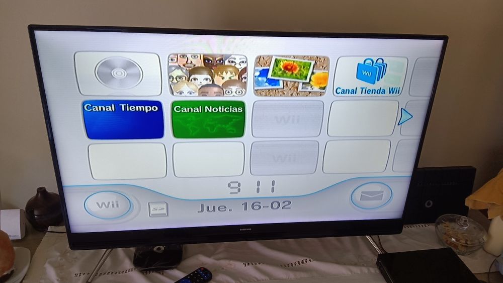 Wii com balança e um comando