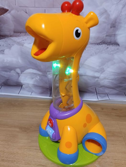 Zabawka edukacyjna Bright Starts Spin & Giggle Giraffe żyrafa fontanna