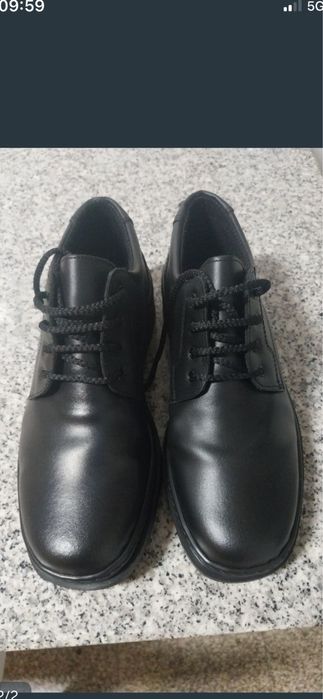 Sapatos Pele Novos