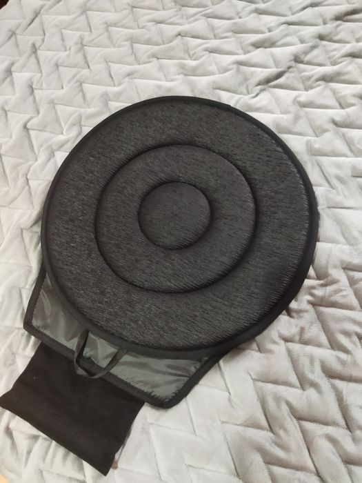 Обертальна подушка для автомобільного сидіння