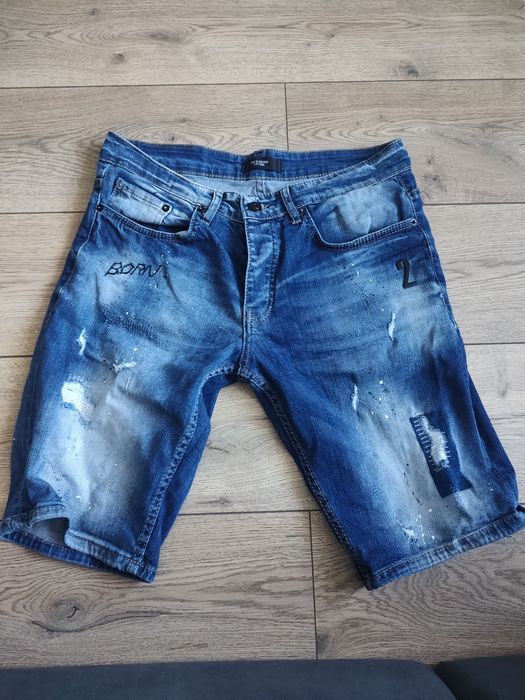 Spodenki jeansowe męskie z przetarciami 31