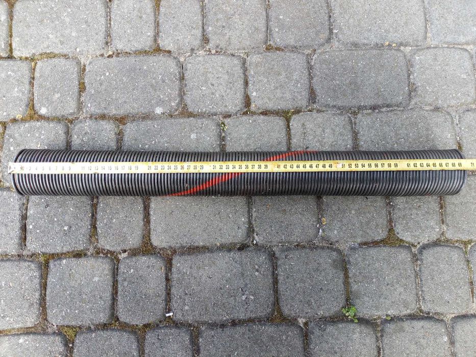 Sprężyna skrętna do bramy segmentowej