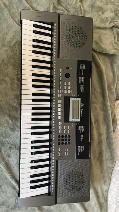 Piano eletrico em bom estado