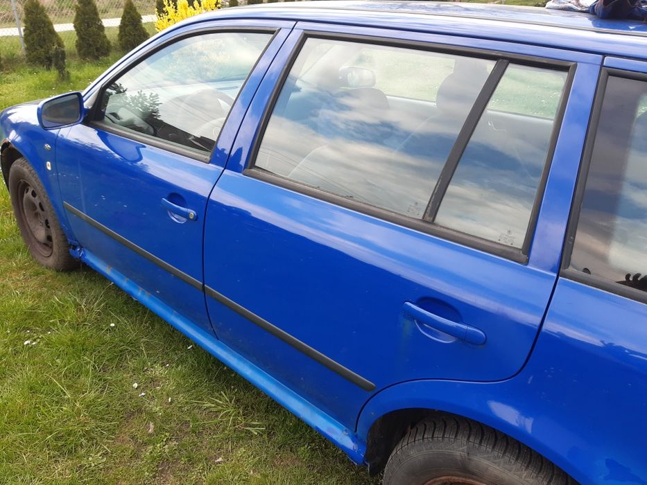 Drzwi przód tył lewe kierowca Skoda Octavia I 1