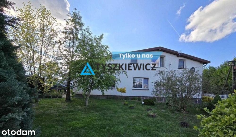 Dom wolnostojący z podziałem na dwa mieszkania.
