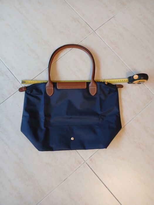 Longchamp como Nova