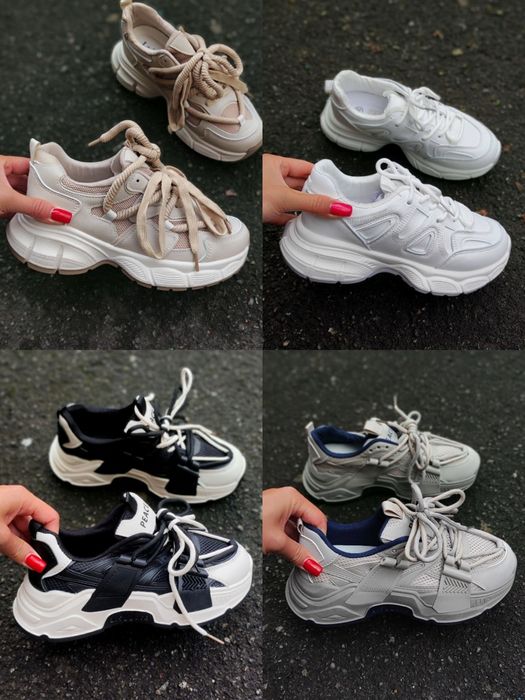 Кросівки на масивній високій підошві сірого кольору з двома